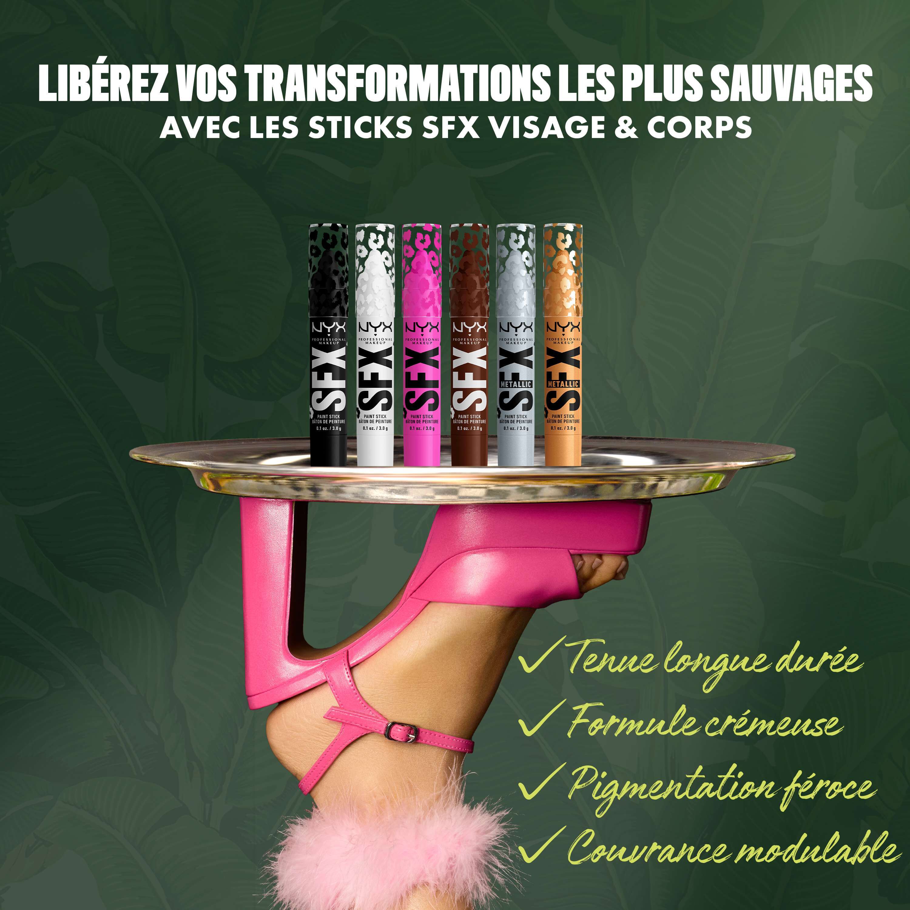 NYX Professional Makeup Party Animals SFX Face & Body Paint Sticks displayed on a tray held by a model wearing pink gloves.