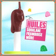 Features a stylized visual of a large, brown, chocolate-like drip descending from an applicator, set against a light blue background. Text highlights key ingredients: "SQUALANE," "RASPBERRY," and "CLOUDBERRY OILS."