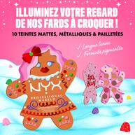 Presents an overhead view of ten individual piles of loose eyeshadow pigment, representing each shade in the NYX Professional Makeup Holiday Gingerbaddie Palette.