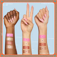 Shows three arms with varying skin tones, each with swatches of the Buttermelt Face Palette shades applied showing both shades.