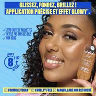 Smiling model holding a NYX Buttermelt Stix highlighter in a golden shade. Text reads: "Butta highlight from head to toe! Butta smooth glide, butta quick glow." Additional callouts: "No glitter fall-out, non-cakey, non-greasy feel." 8-hour wear badge and icons for vegan, cruelty-free, no retouching are included.